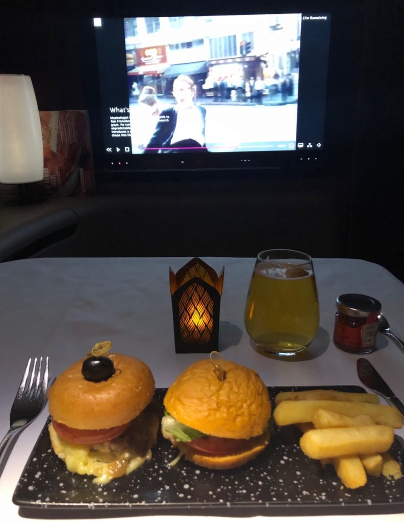 qatar airways first class airbus a380 doh doha fra frankfurt qr67 onboard bar burger